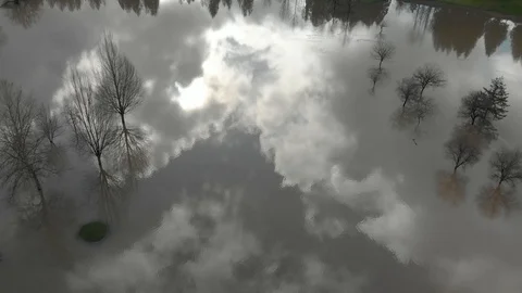 Top down aerial view of flooded golf putting green Stock Footage 124188631