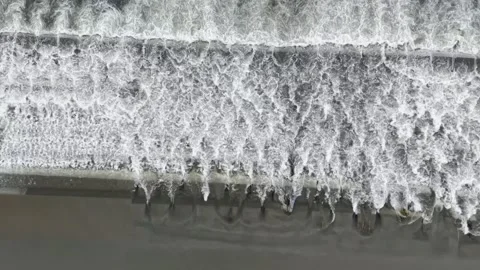 Top Down Aerial View of Flowing Water Over Tofu Rocks in Hsinchu, Taiwan Stock Footage 342124863