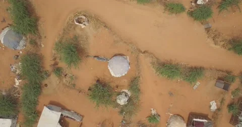 Top down aerial view flying up of refugee camp in Dadaab, Kenya in East Africa Stock Footage 147048456