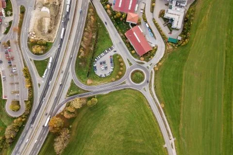 Top down aerial view of freeway interstate road with moving traffic cars in r Stock-Fotos
