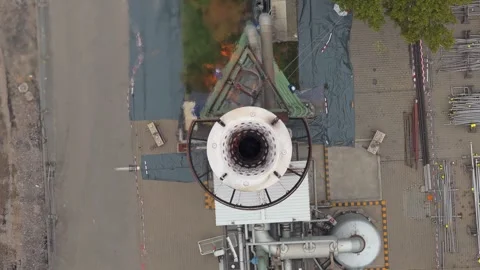 Top down aerial view of gas flare igniting at industrial plant 스톡 동영상 327602569