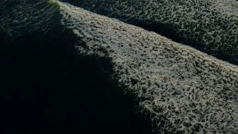 Top down aerial view of giant ocean waves crashing and foaming Stock Footage 150128413