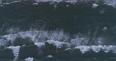 Top-down aerial view of giant ocean waves crashing and foaming. Abstract view Stock Footage 201062734