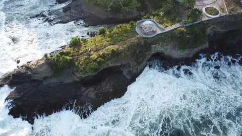 Top down aerial view of giant ocean waves crashing and foaming Stock Footage 236555114