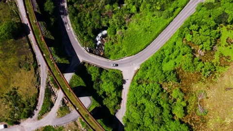 Top Down Aerial View of The Gleensk Viaduct Bridge and a Winding Road With a Video stock 337641424