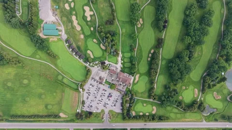 Top-Down Aerial View of Golf Course and Clubhouse Stock Footage 344779607