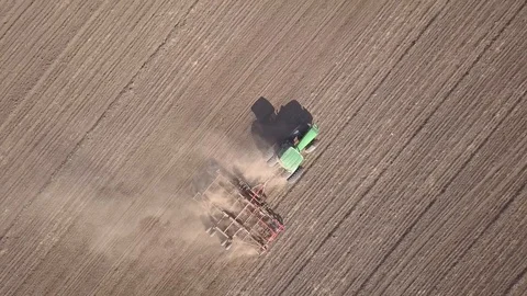 Top down aerial view of green tractor cu... | Stock Video | Pond5