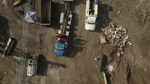 Top Down Aerial View of Heavy Truck Towing Metal Construction on New Real Vídeos de archivo 224084847