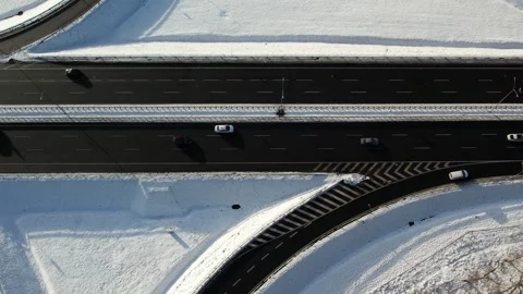 Top-Down Aerial View of Highway in Winter with Snow 스톡 동영상 301346039