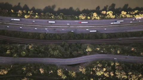 Top-down aerial view of highways and railways running parallel to the Tennessee Stock-Footage 320148401