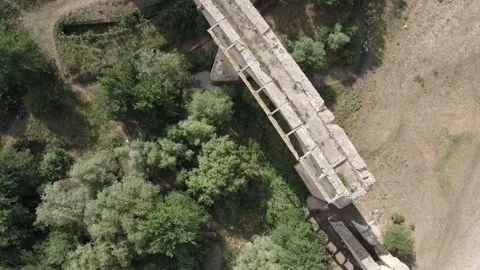 Top-down aerial view of the historic German Bridge ruins Stock Footage 338054139