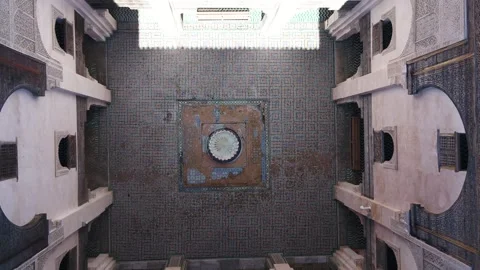 Top-Down Aerial View of Historic Madrassa Courtyard and Marble Fountain in Fez Stock Footage 345267288