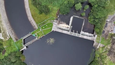 Top Down Aerial View Of Hydroelectric Dam And Water Reservoir Stock-Footage 345544619