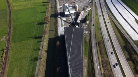 Top down aerial view of industrial building with solar panels Видео 332247331