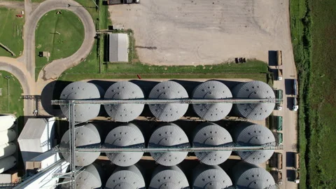 Top down aerial view of industrial grain storage silos facility Stock Footage 341077139
