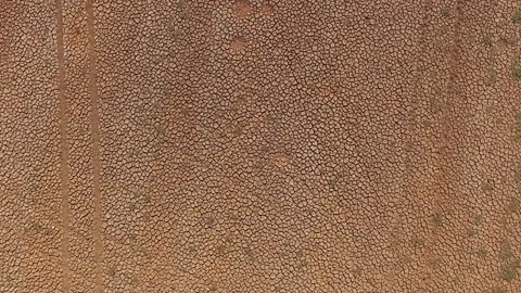 Top-down aerial view of land scarred by extreme drought 库存影片 316840983