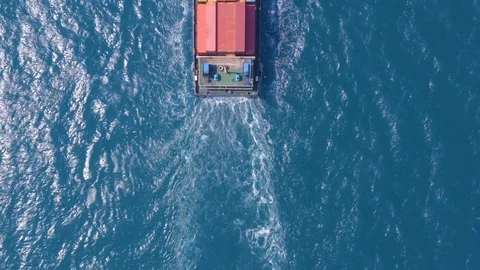Top down Aerial View of a large container ship sailing Video stock 121012518