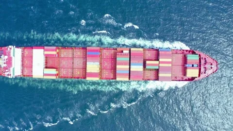 Top down aerial view of a large container ship cruising the deep blue ocean Stock-Footage 332870058