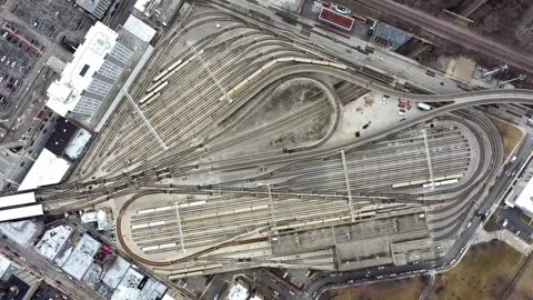 Top Down Aerial View of Large Urban Railway Yard and Train Tracks Stock Footage 342754412