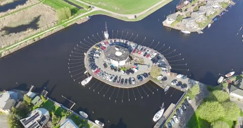 Top down aerial view of a leisure yacht boat dock, in round pattern. Stock Footage 240123218