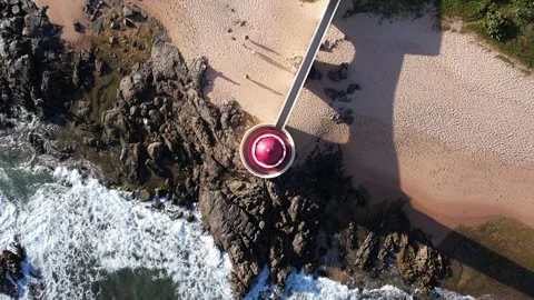 Top down aerial view of lighthouse and connecting walkway in concrete Stock Footage 301373903