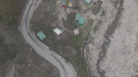 Top-Down Aerial View of Maldevta Bridge and Song River, Uttarakhand Stock Footage 330995831