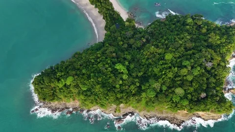 Top down aerial view of Manuel Antonio National Park peninsula, Costa Rica Stock Footage 328171583