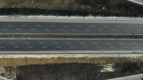 Top Down aerial view of modern transport junction highway with few moving cars Vidéo 132733786