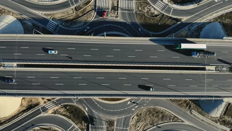 Top Down aerial view of modern transport junction highway with few moving cars 스톡 동영상 132734330