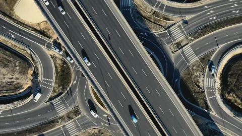 Top Down aerial view of modern transport junction highway with few moving cars Vidéo 132734843