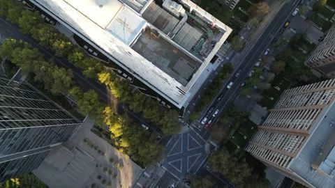 Top-Down Aerial View of Modern Office Buildings and Urban Intersection Stock Footage 296922554