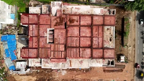 Top-Down Aerial View of a Modern Construction Building in a Busy City Stock-Footage 344021339