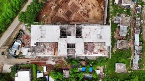 Top-Down Aerial View of a Modern Construction Building in a Busy City Stock-Footage 344021454