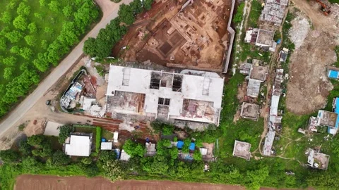 Top-Down Aerial View of a Modern Construction Building in a Busy City Stock-Footage 344021464