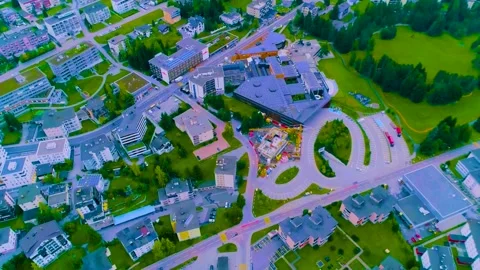 Top Down Aerial View of Modern Alpine Town and Roads Stock Footage 346732669