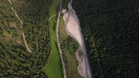 Top Down Aerial View of Mountain River Flowing Through Forest in Eng Alm Austria Stock Footage 340488601