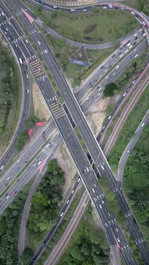 Top-down aerial view of multilane highway intersection in Kuala Lumpur, Malaysia Stock Footage 313856154
