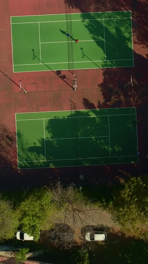 Top down aerial view of multiple outdoor tennis courts Stock-Footage 342589743