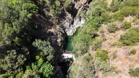 Top down aerial view of narrow river gorge, Benahavis, Spain Stock Footage 339579600