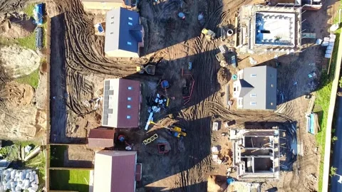 Top down aerial view of a new housing estate under construction Video stock 343018823