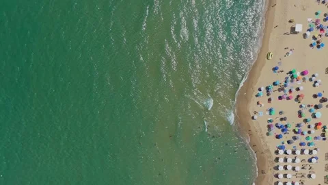 Top down aerial view of Obzor beach and umbrellas in Bulgaria Stock Footage 344463050