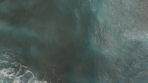 Top down aerial view of the ocean ripples and waves with foam Stock Footage 112032639