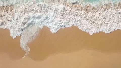Top-Down Aerial View of Ocean Waves Breaking Sandy Beach, Emerald Water Sea Foam Stock Footage 329971287
