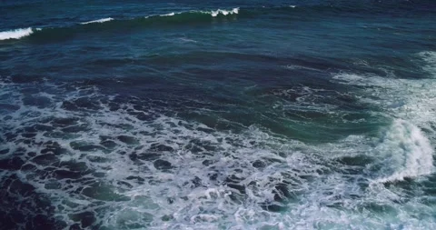 Top Down Aerial View of Ocean Surface and Rolling Wave Texture Видео 330585441