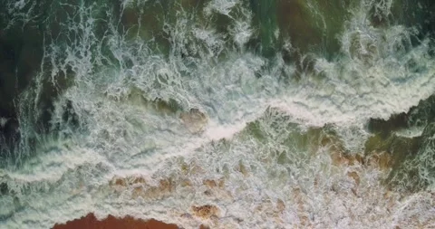 Top Down Aerial View of Ocean Waves Creating Natural Water Texture 스톡 동영상 330586757