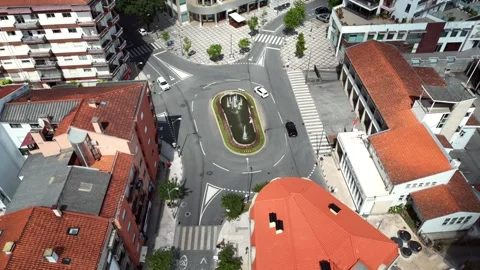 Top-Down Aerial View of an Oval Traffic Roundabout in Coimbra Stock-Footage 345840306