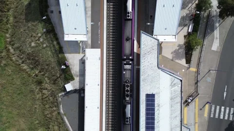 Top down aerial view of passenger train Stock Footage 332746419