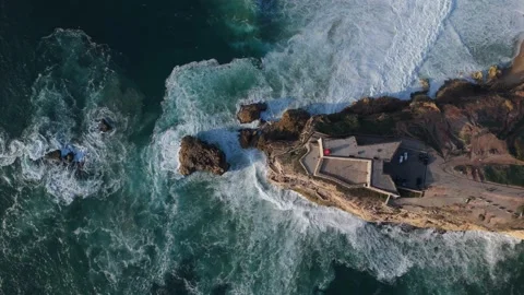 Top-down Aerial view of the people on the Fort of Sao Miguel Arcanjo Lighthouse Stock Footage 295852084