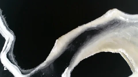 Top down aerial view of poor condition frozen lake 4k Stock Footage 98842692