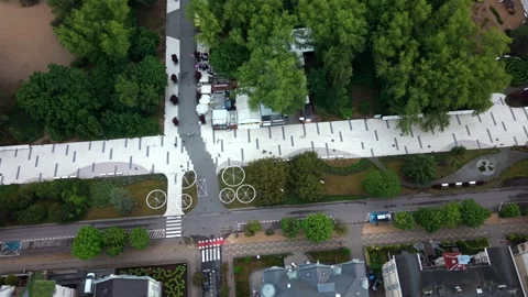 Top-down aerial view of a popular pedestrian promenade in Świnoujście with a 動画素材 348762164